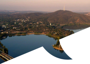 An aerial view of Lake Burley Griffin and Black Tower, in a speech bubble shape